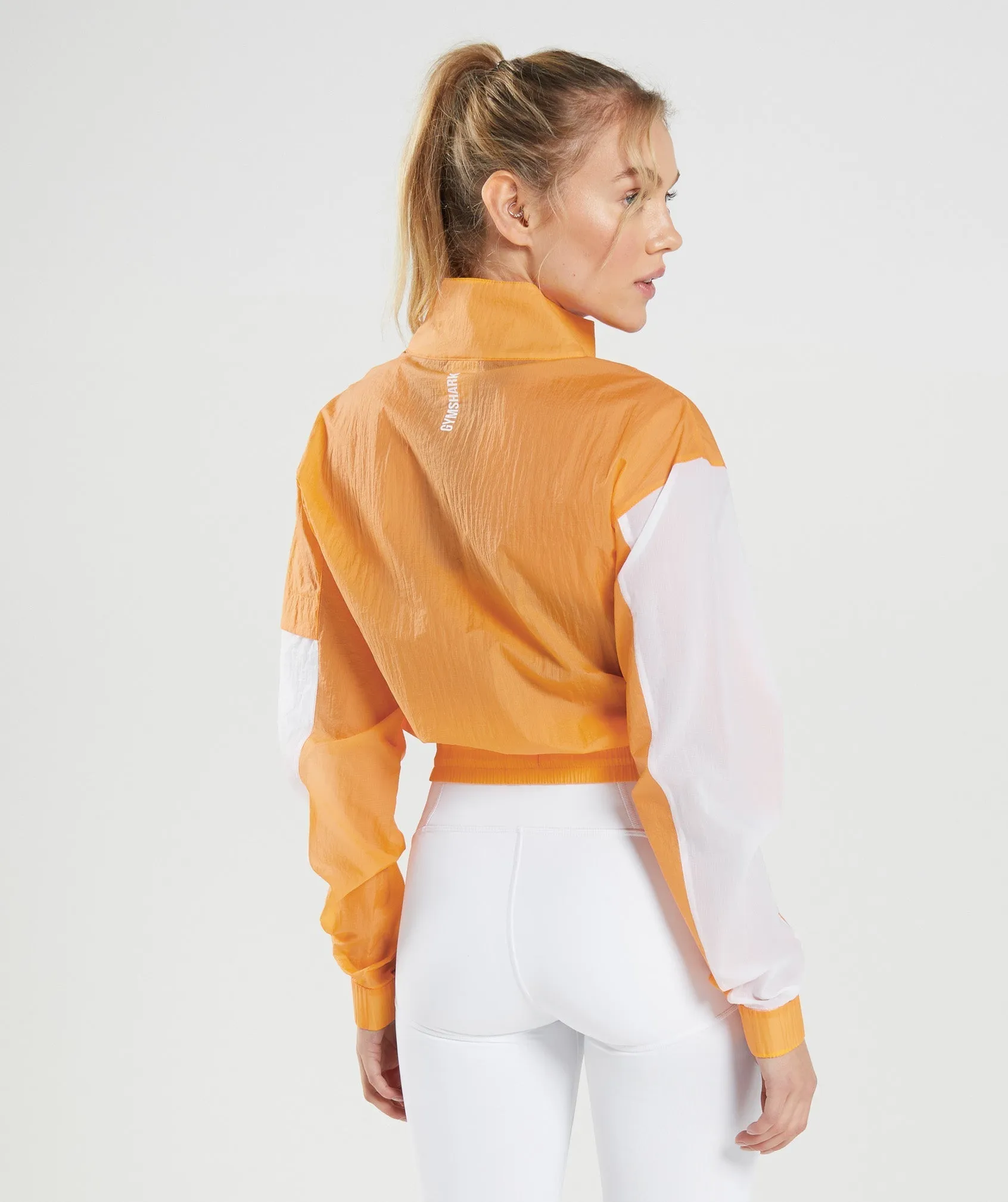 Gymshark Pulse Woven Jacket - Apricot Orange/White