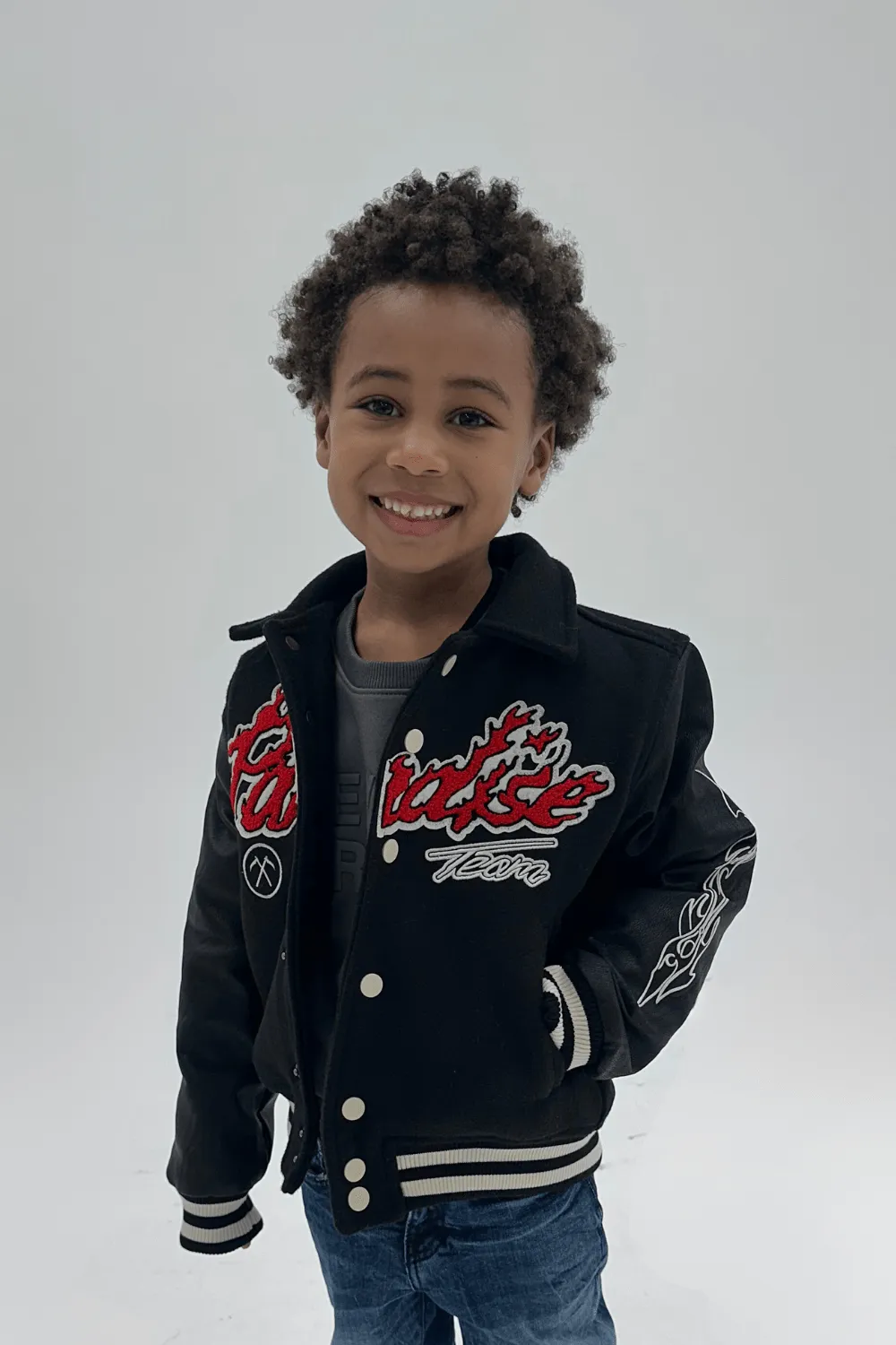 Kids Paradise Tour Varsity Jacket (Black)