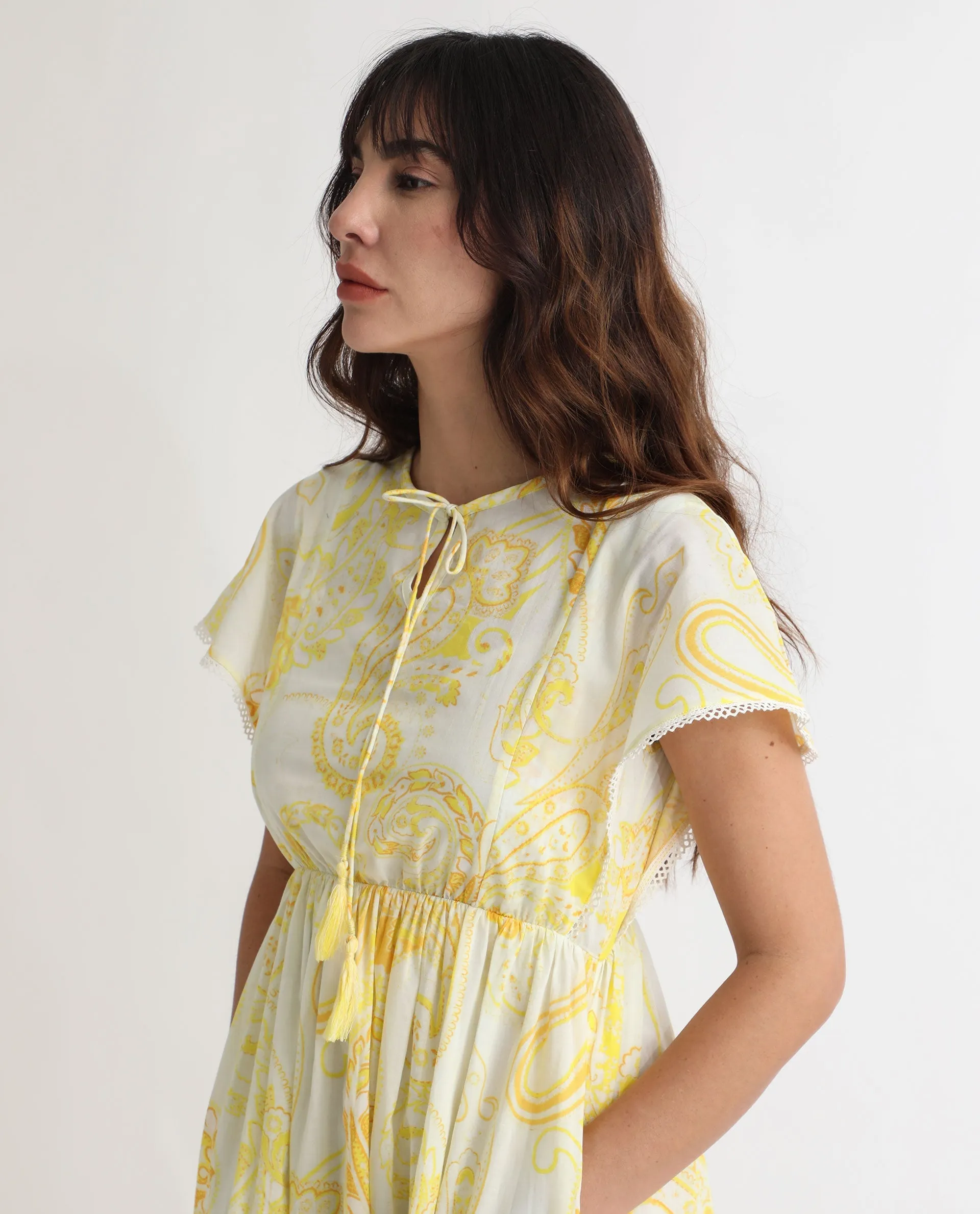 Rareism Women Lammer Light Yellow Cotton Fabric Short Sleeves Tie-Up Closure Tie-Up Neck Extended Sleeve Relaxed Fit Paisley Print Maxi Tiered Dress